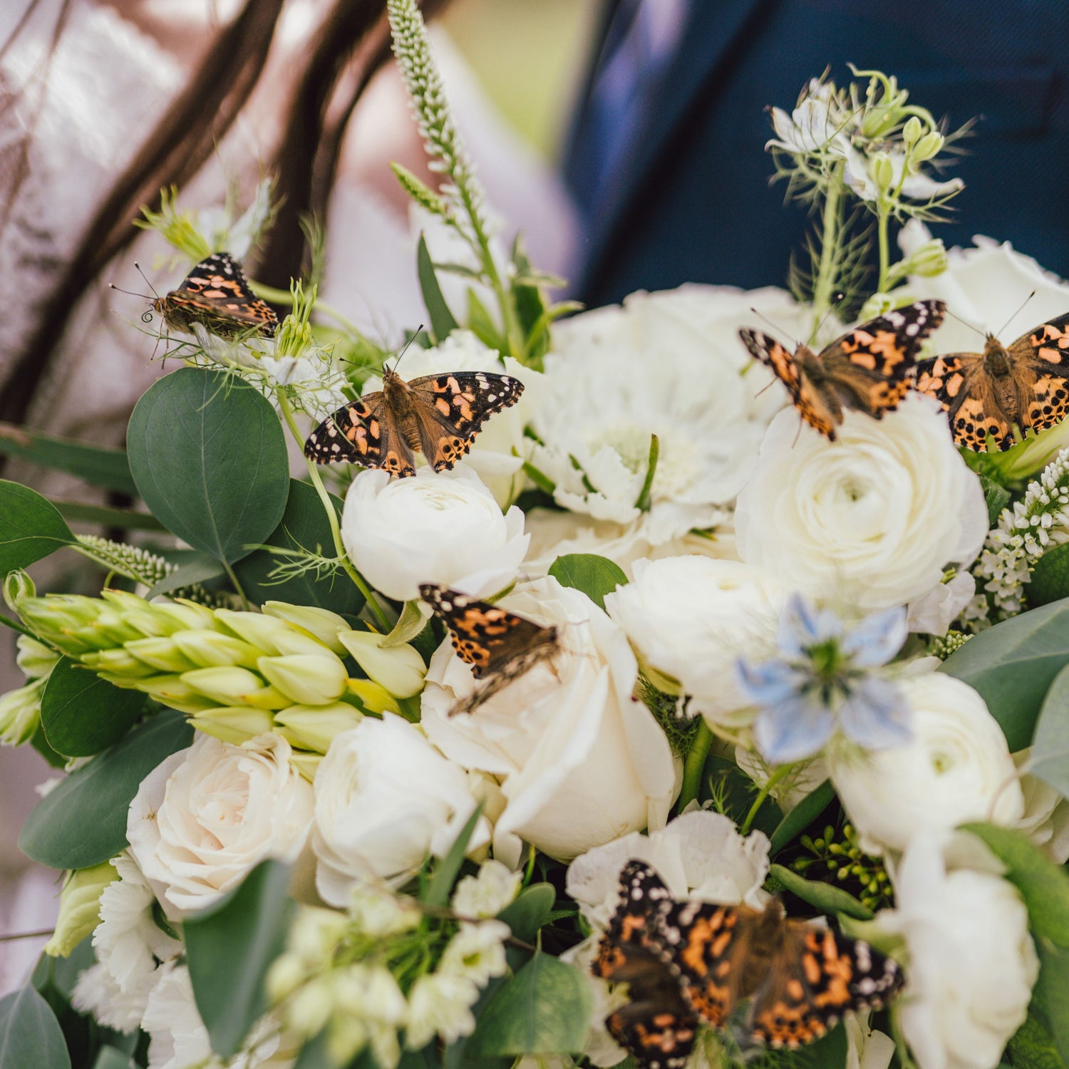 Alternative Wedding Butterfly Release in bouquet 